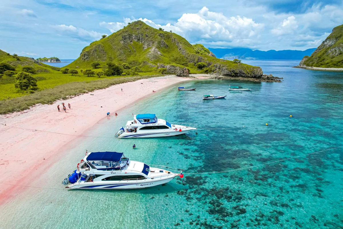 Labuan Bajo harbor with wooden boats, Flores Island gateway to Komodo National Park